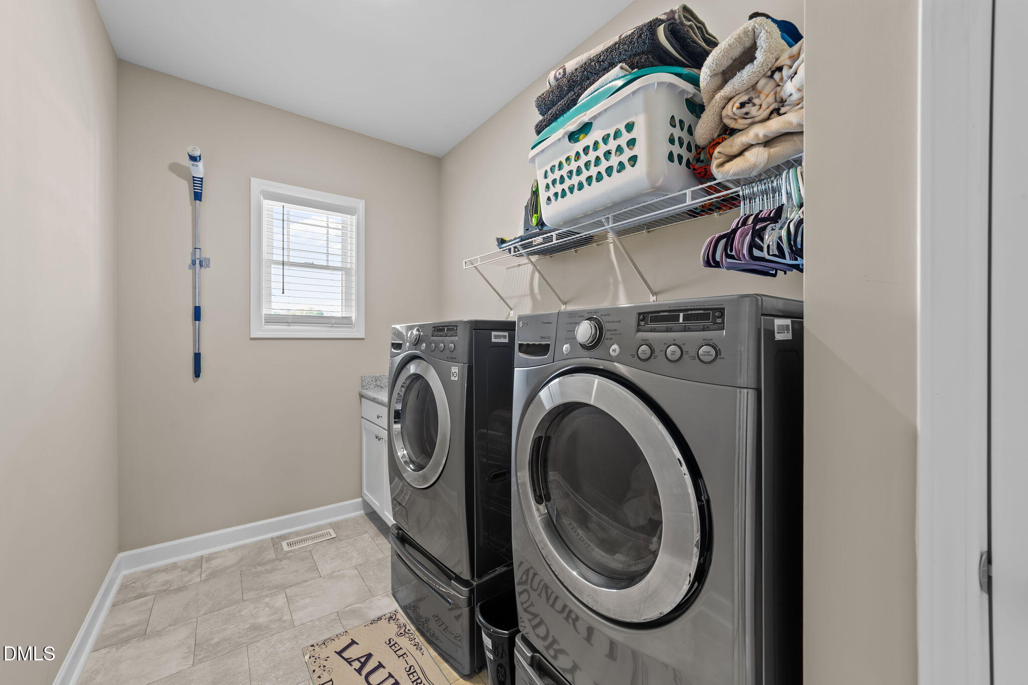 73 Rabbit Run Drive Smithfield, NC 27577 - Photo 20 of 46 a utility room with dryer and washer