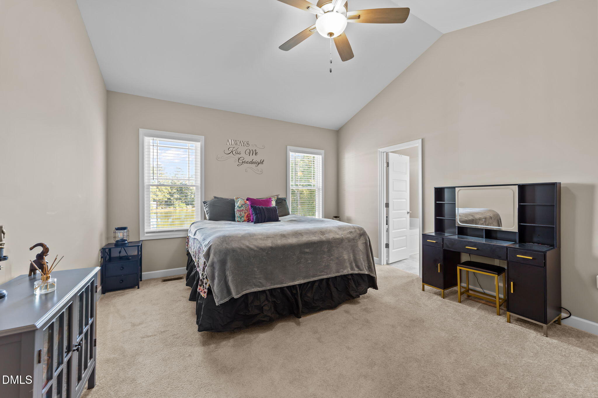 73 Rabbit Run Drive Smithfield, NC 27577 - Photo 21 of 46 a spacious bedroom with a bed and a flat screen tv