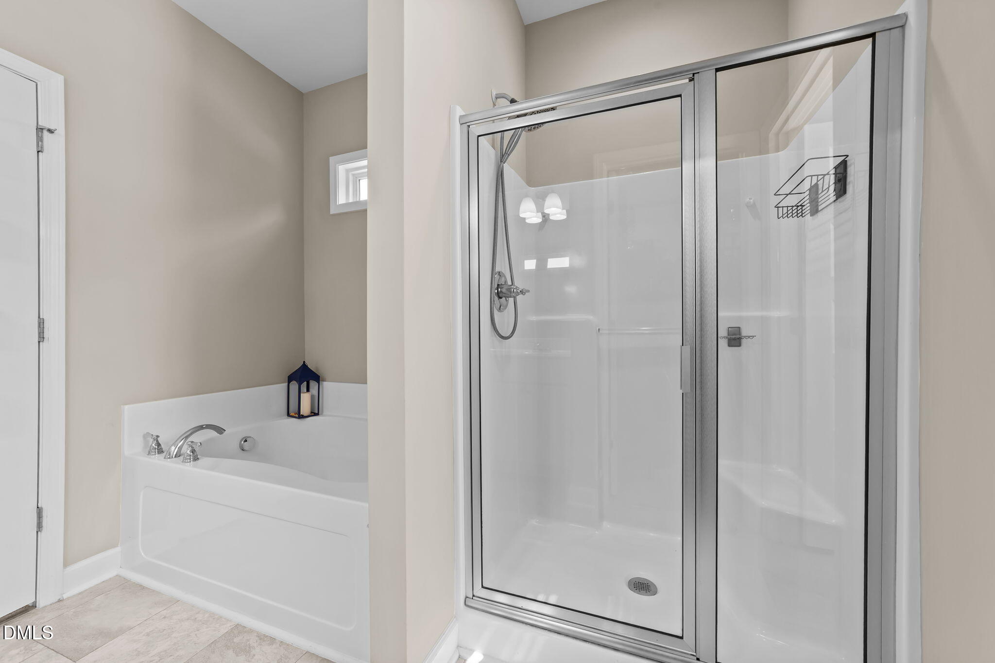 73 Rabbit Run Drive Smithfield, NC 27577 - Photo 24 of 46 a bathroom with a bathtub and a shower