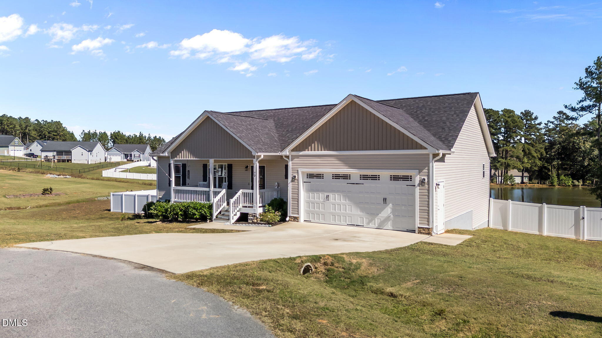 73 Rabbit Run Drive Smithfield, NC 27577 - Photo 3 of 46 a front view of a house with a yard