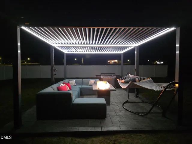 a room with furniture and lamp