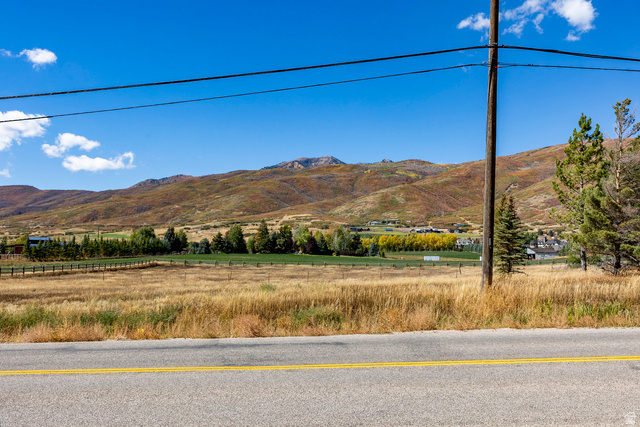 1160 Stringtown Road Midway, UT 84049 - Photo 11 of 26 View of mountain background featuring rural landscape