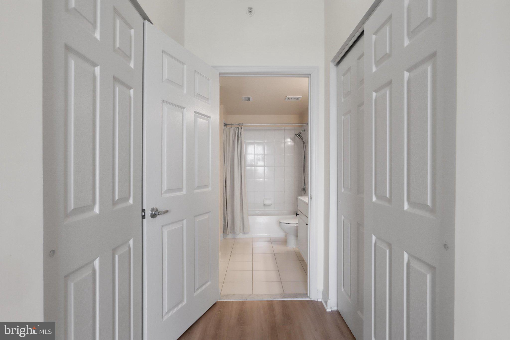 2726 Gallows Road, Unit 1506 Vienna, VA 22180 - Photo 15 of 35 Inviting hallway to serene bathroom.