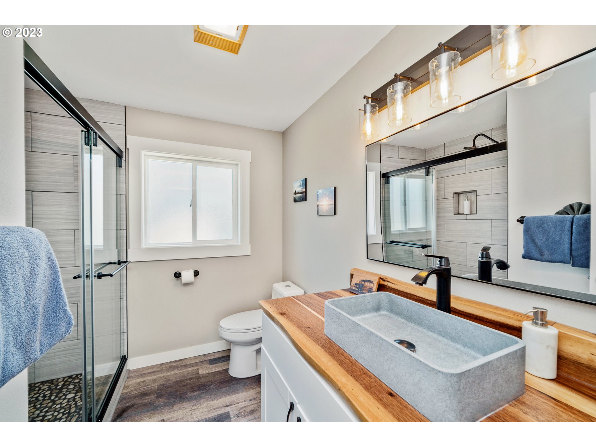 34010 Mallard Avenue Nehalem, OR 97131 - Photo 13 of 25 a bathroom with a sink and a mirror