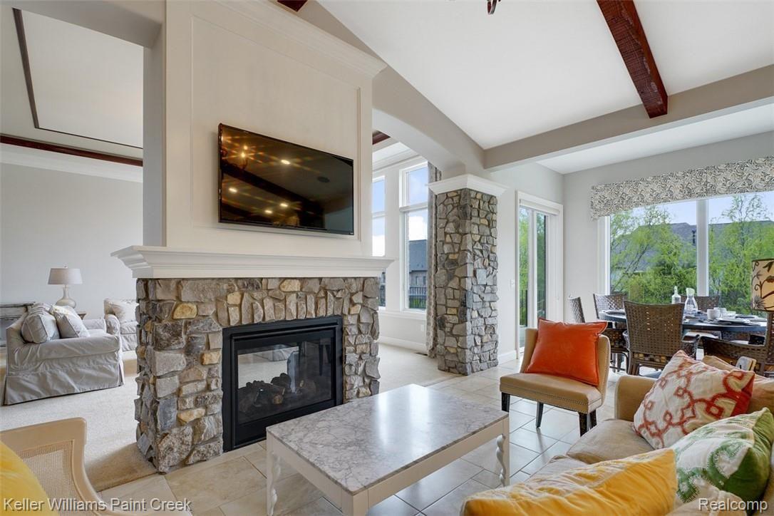 2888 North Addison Circle Rochester, MI 48306 - Photo 28 of 73 2-Way Stone Fireplace into the Family Room