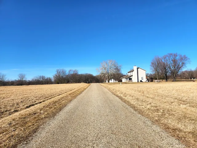 a view of dirt yard and ocean view