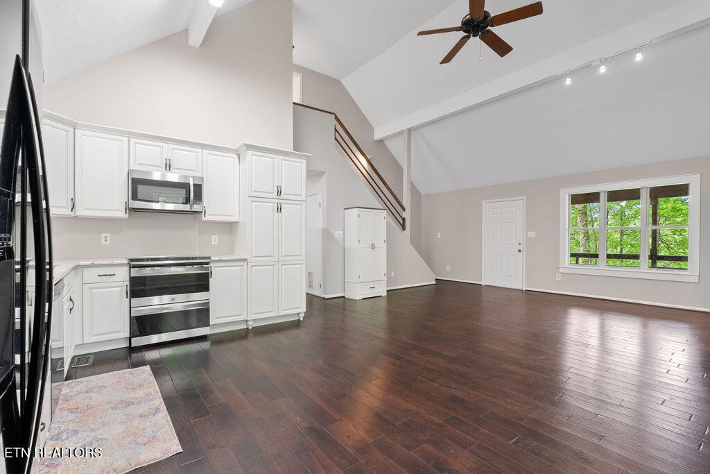 8908 Ellis Lane Powell, TN 37849 - Photo 10 of 37 a view of kitchen and entryway with wooden floor