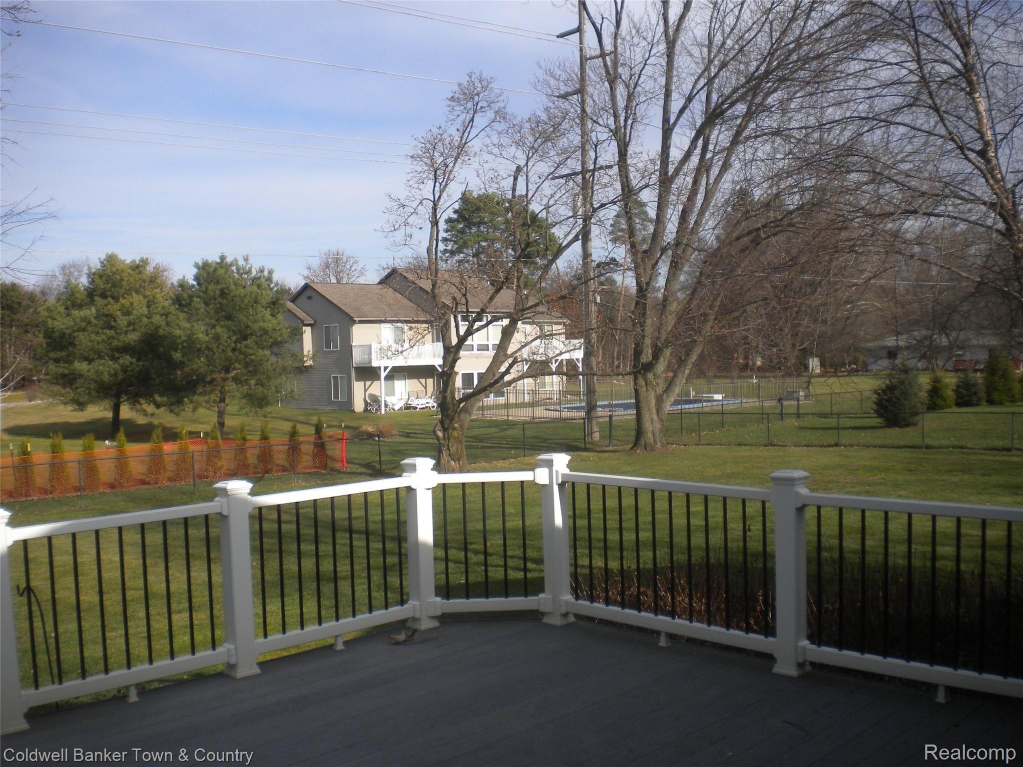 858 Henderson Road Howell, MI 48855 - Photo 41 of 50 Deck 858 Henderson Rd Howell Mi 48855