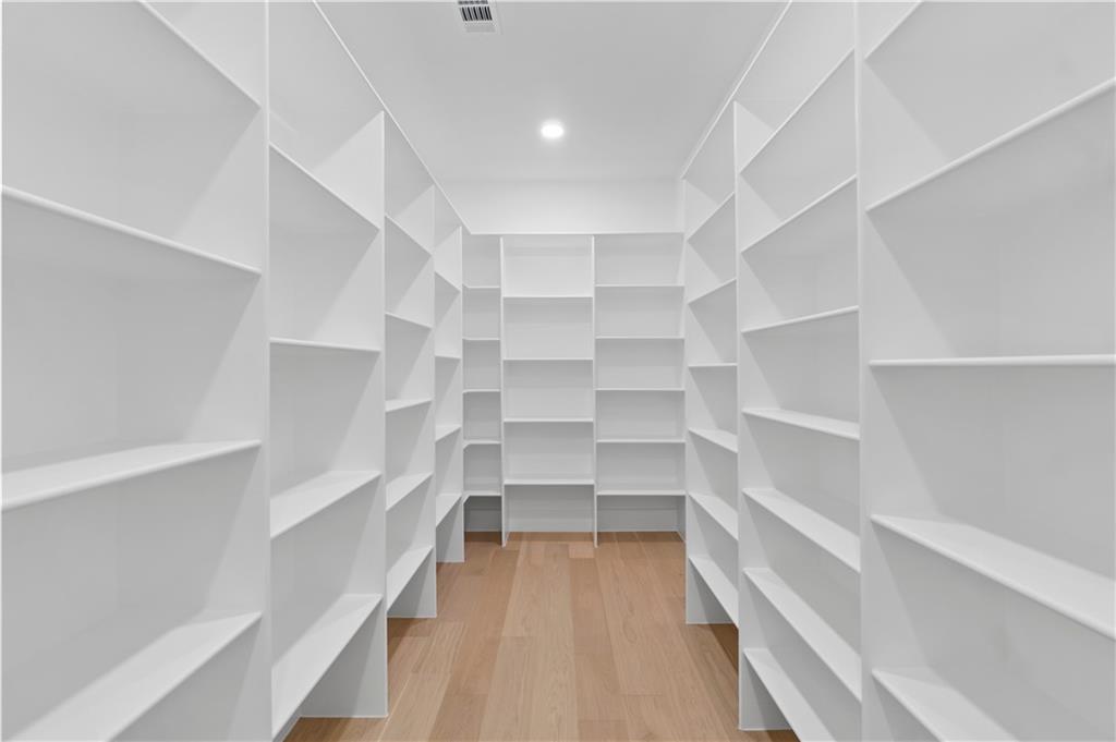 2709 Collins Hill Road Lawrenceville, GA 30043 - Photo 23 of 67 a view of walk in closet with empty racks