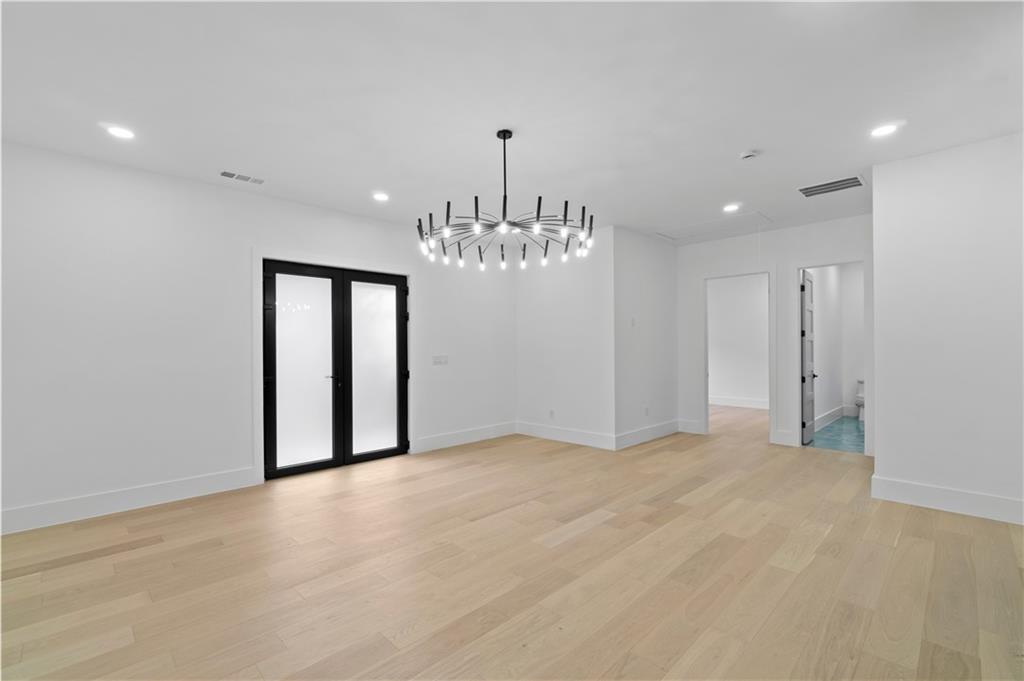 2709 Collins Hill Road Lawrenceville, GA 30043 - Photo 62 of 67 a view of an empty room with chandelier and chandelier