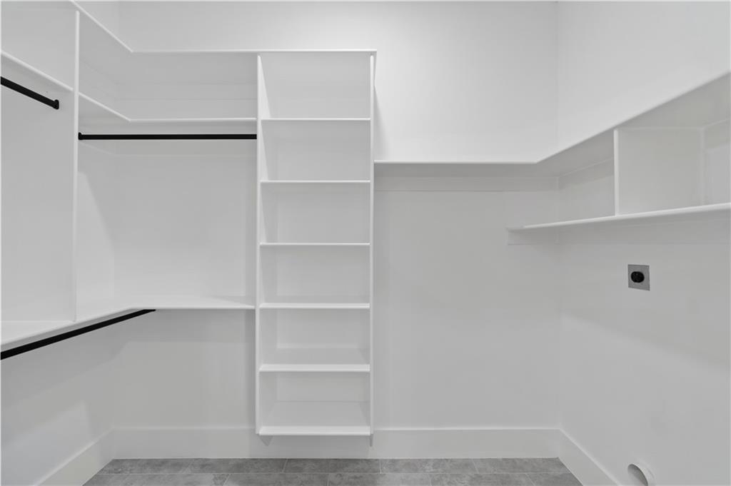 2709 Collins Hill Road Lawrenceville, GA 30043 - Photo 64 of 67 a view of an empty walk in closet