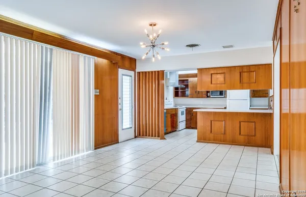 a room with granite countertop furniture and a sink
