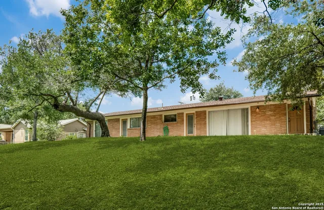 a house view with a garden space