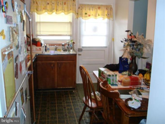 9007 Samoset Road Randallstown, MD 21133 - Photo 3 of 11 a dining room with furniture and window