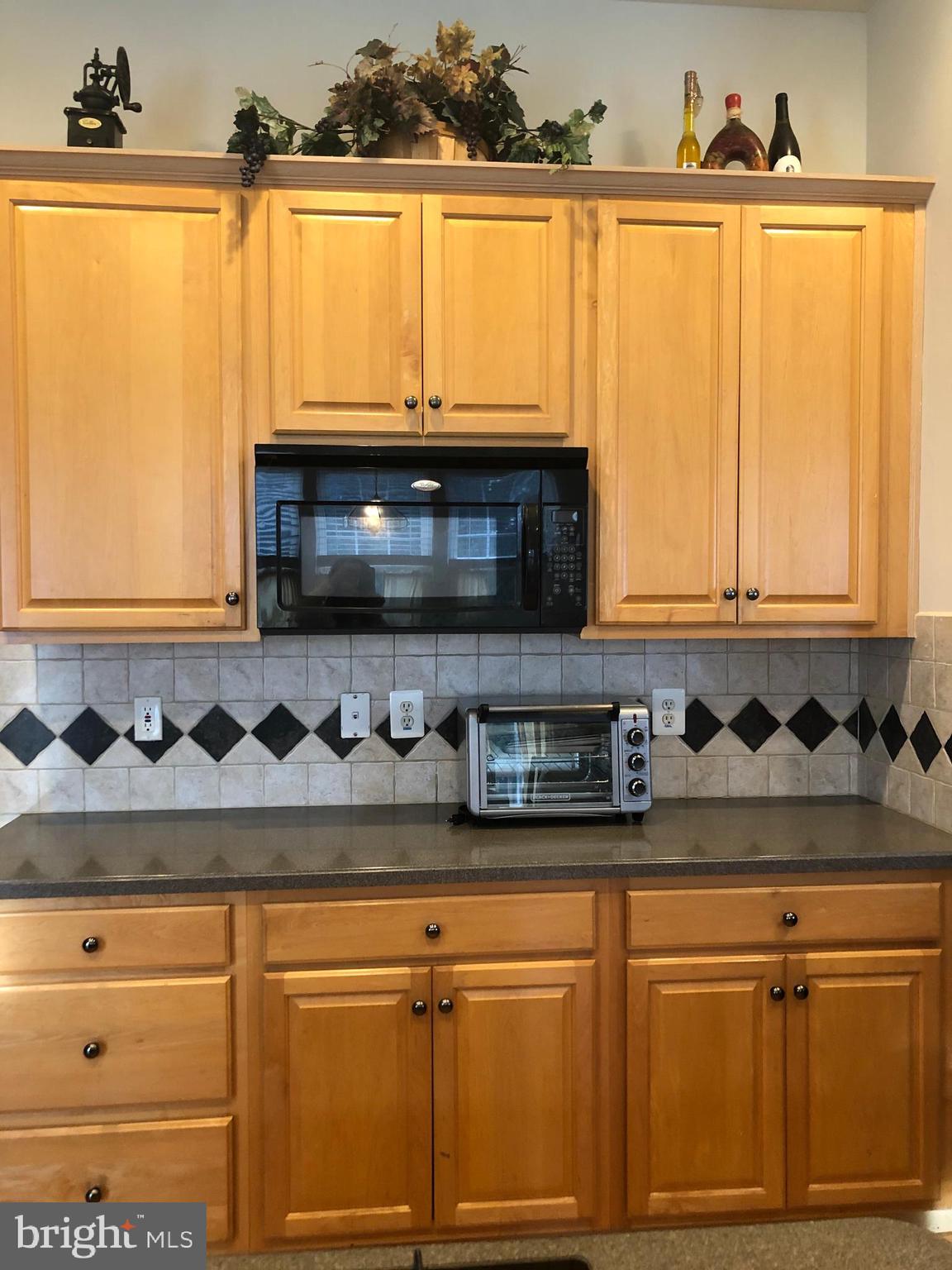4853 Muddler Way Fairfax, VA 22030 - Photo 7 of 31 Kitchen Cabinet with ample counter space