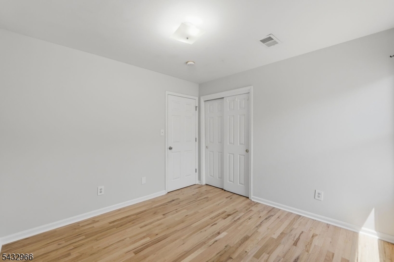 130 3rd Street, Unit 2 Passaic, NJ 07055 - Photo 7 of 12 a view of an empty room