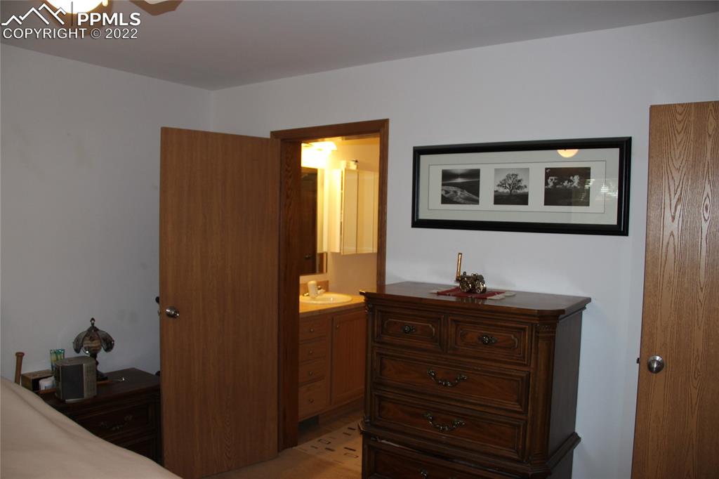 749 9th Street Calhan, CO 80808 - Photo 18 of 43 a bathroom with a sink and a mirror