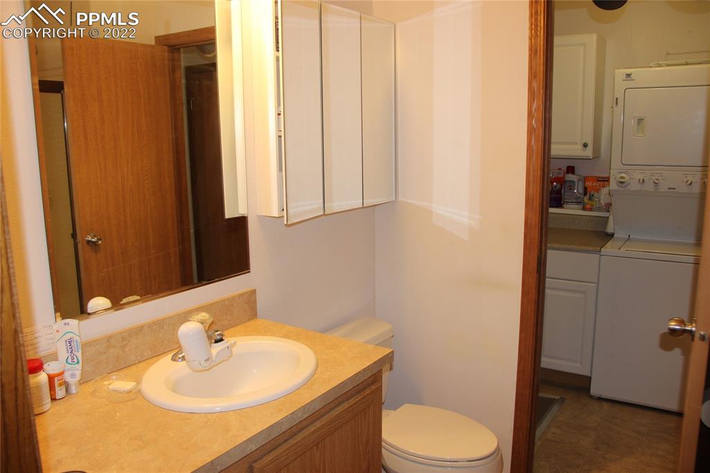 749 9th Street Calhan, CO 80808 - Photo 23 of 43 a bathroom with a sink toilet and shower
