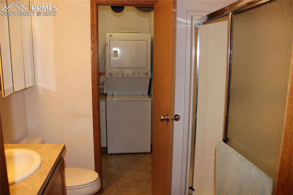 749 9th Street Calhan, CO 80808 - Photo 24 of 43 a bathroom with a toilet and a shower