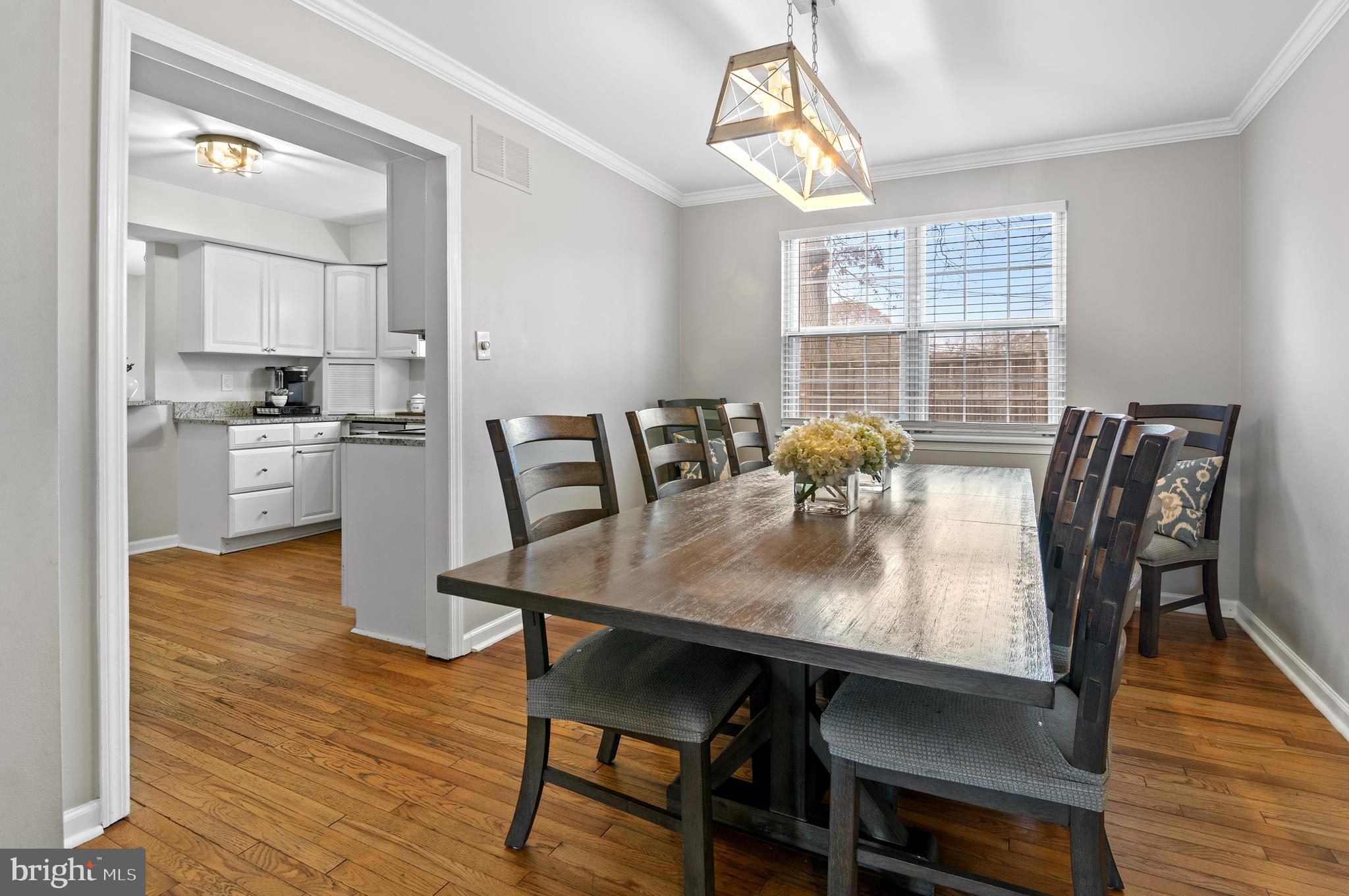 40 Dorba Court Severna Park, MD 21146 - Photo 15 of 67 a view of a dining room with furniture window and wooden floor
