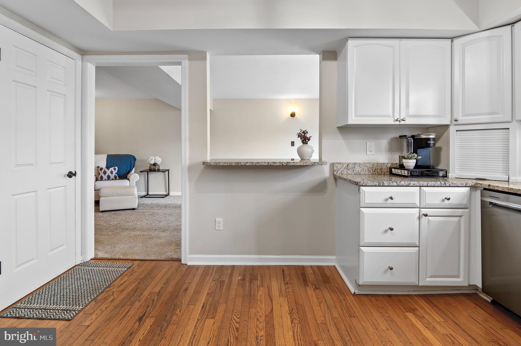 40 Dorba Court Severna Park, MD 21146 - Photo 17 of 67 a view of a kitchen with wooden floor and electronic appliances