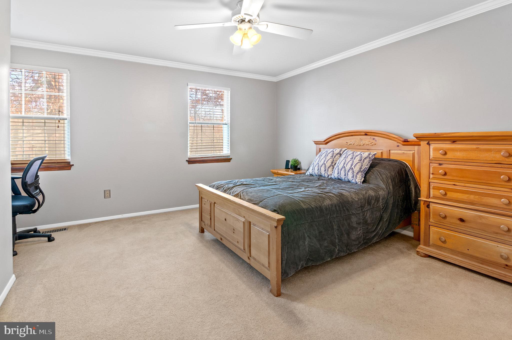 40 Dorba Court Severna Park, MD 21146 - Photo 29 of 67 a bedroom with a bed and a dresser