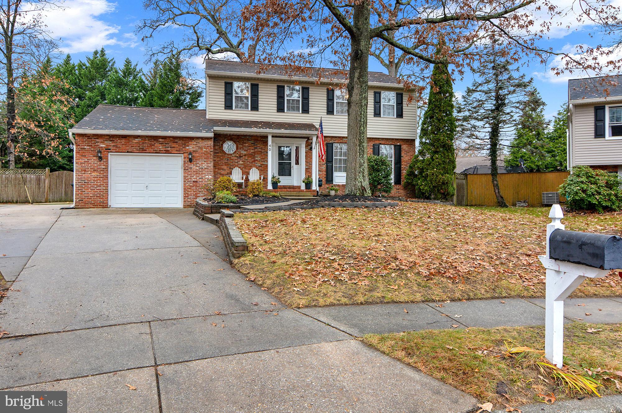40 Dorba Court Severna Park, MD 21146 - Photo 4 of 67 a front view of a house with garden