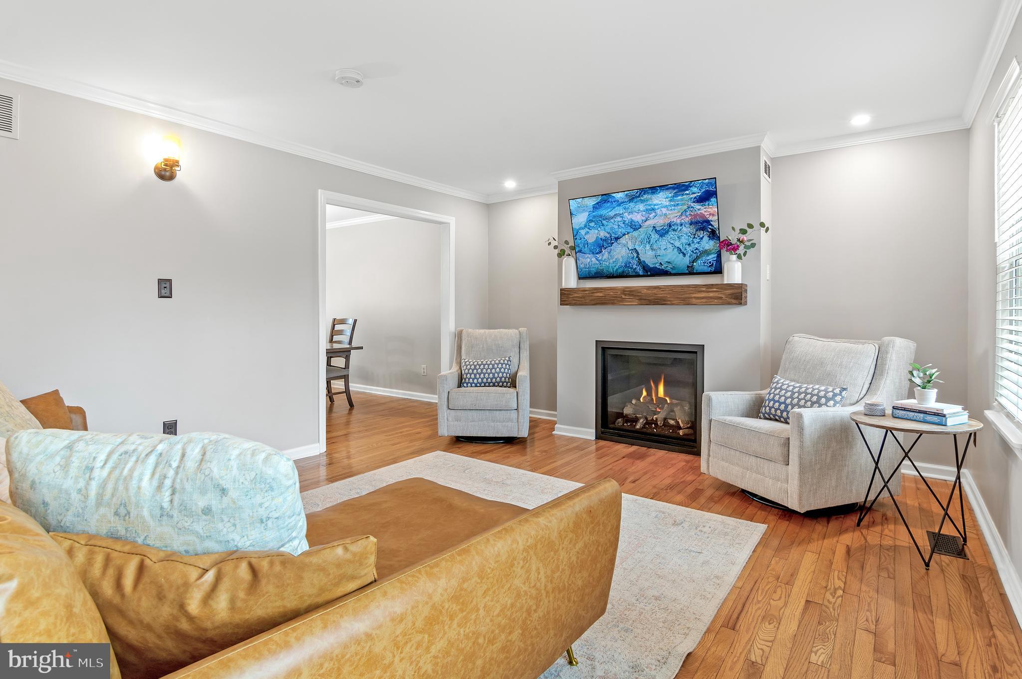 40 Dorba Court Severna Park, MD 21146 - Photo 6 of 67 a living room with furniture and a fireplace