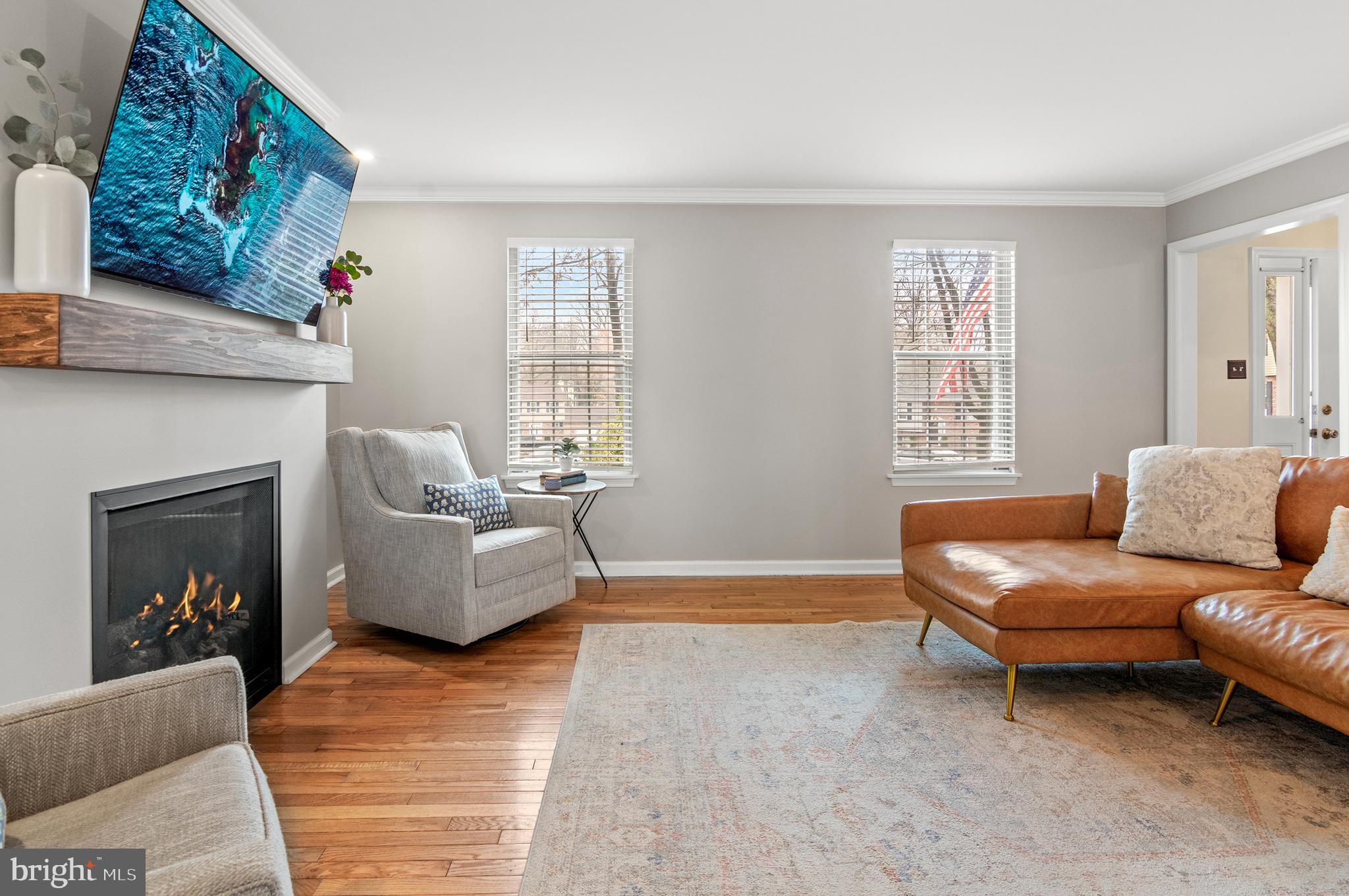 40 Dorba Court Severna Park, MD 21146 - Photo 9 of 67 a living room with furniture and a fireplace