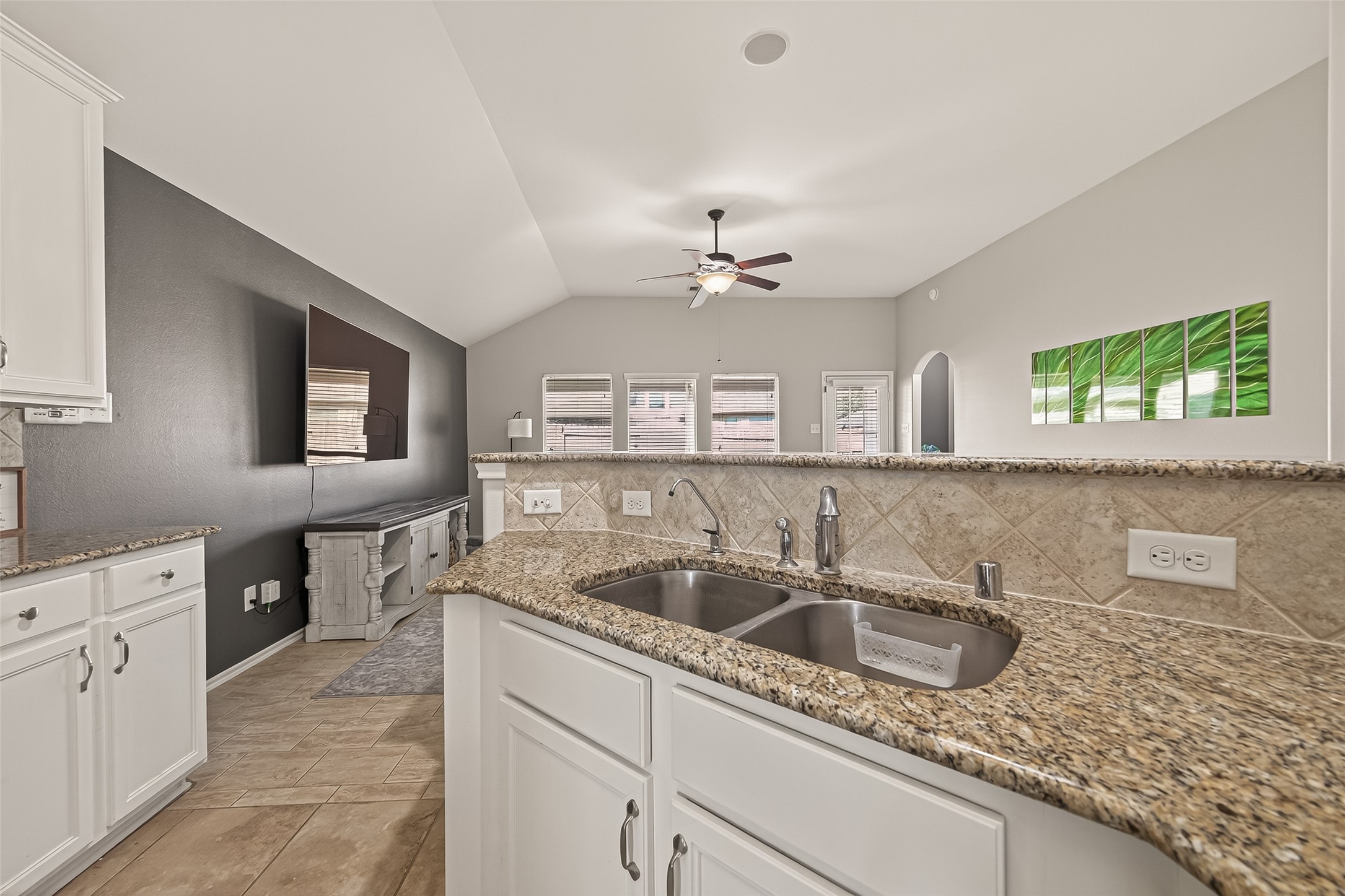 15607 Mossy Park Cypress, TX 77429 - Photo 15 of 34 a kitchen with stainless steel appliances granite countertop a sink a stove and cabinets
