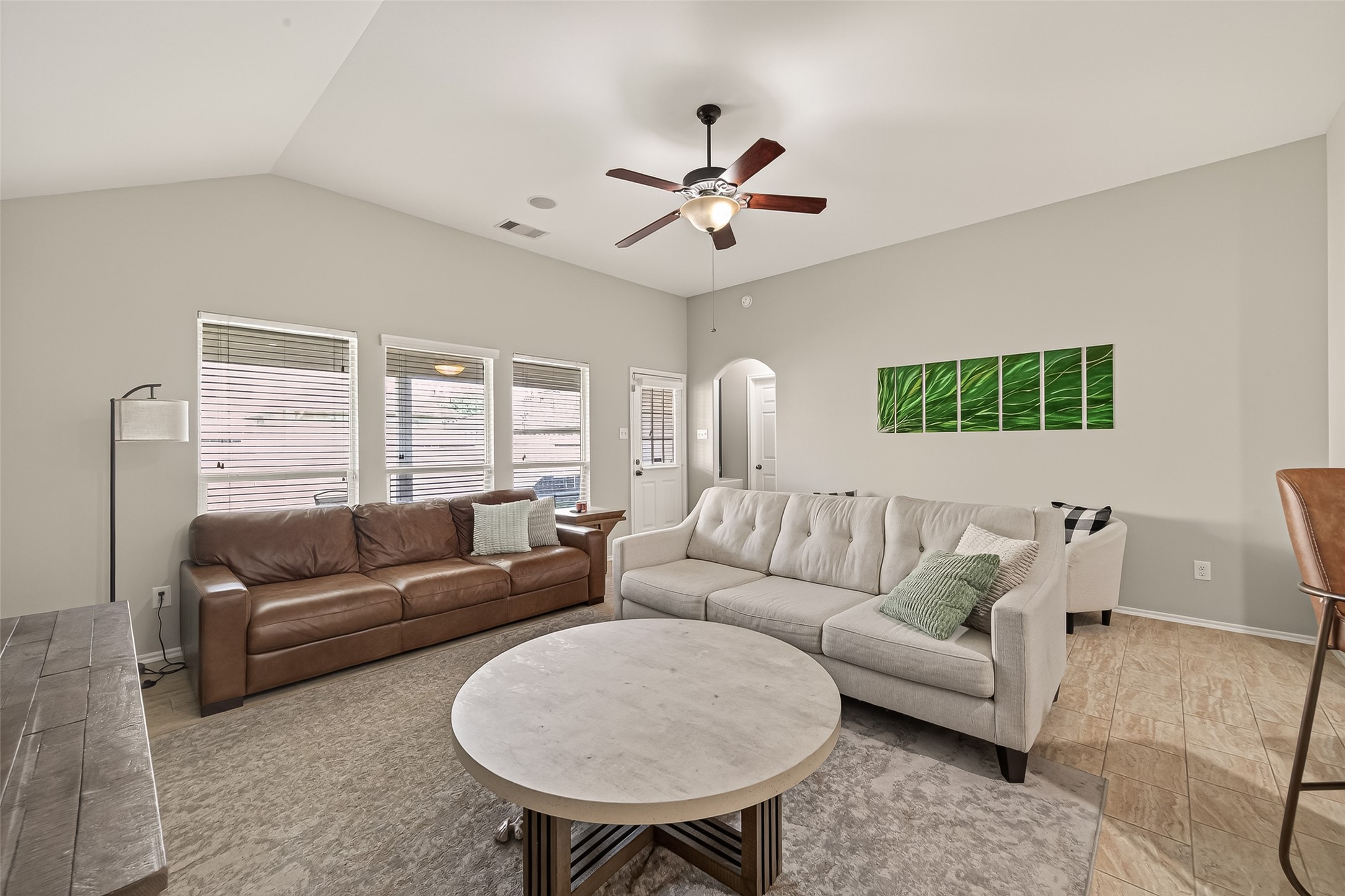 15607 Mossy Park Cypress, TX 77429 - Photo 18 of 34 a living room with furniture and a large window