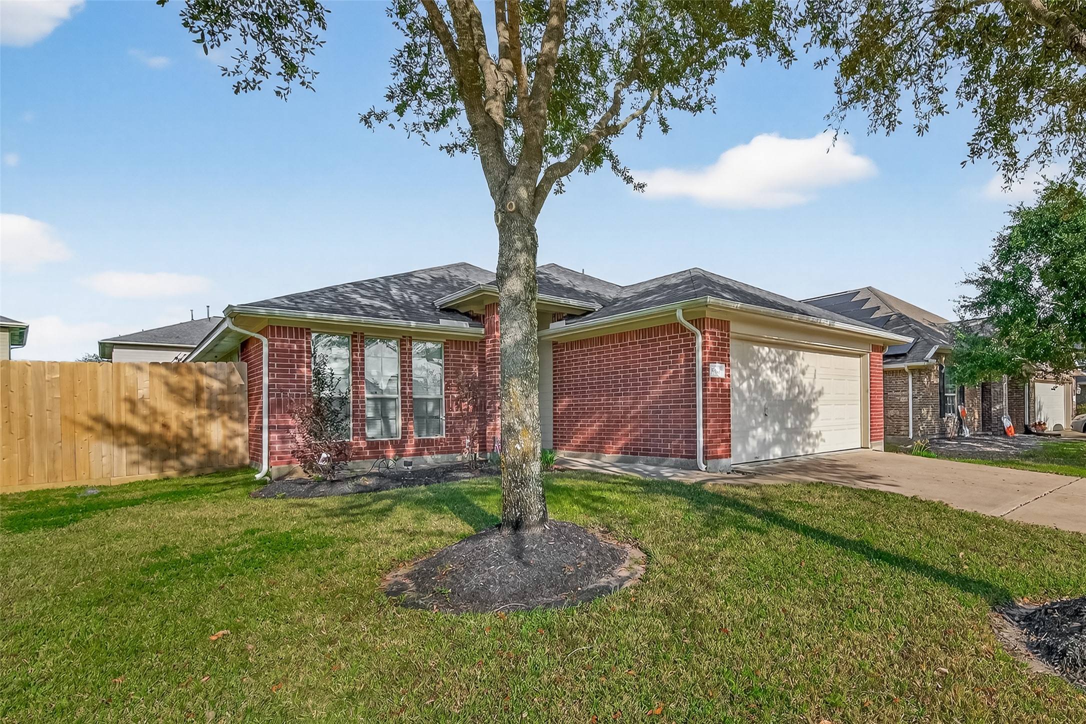 15607 Mossy Park Cypress, TX 77429 - Photo 2 of 34 a front view of a house with garden