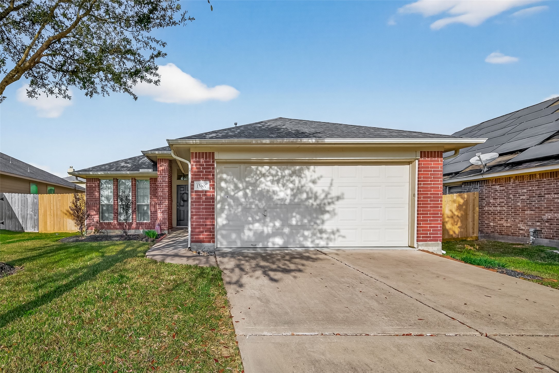 15607 Mossy Park Cypress, TX 77429 - Photo 3 of 34 a front view of a house with a yard