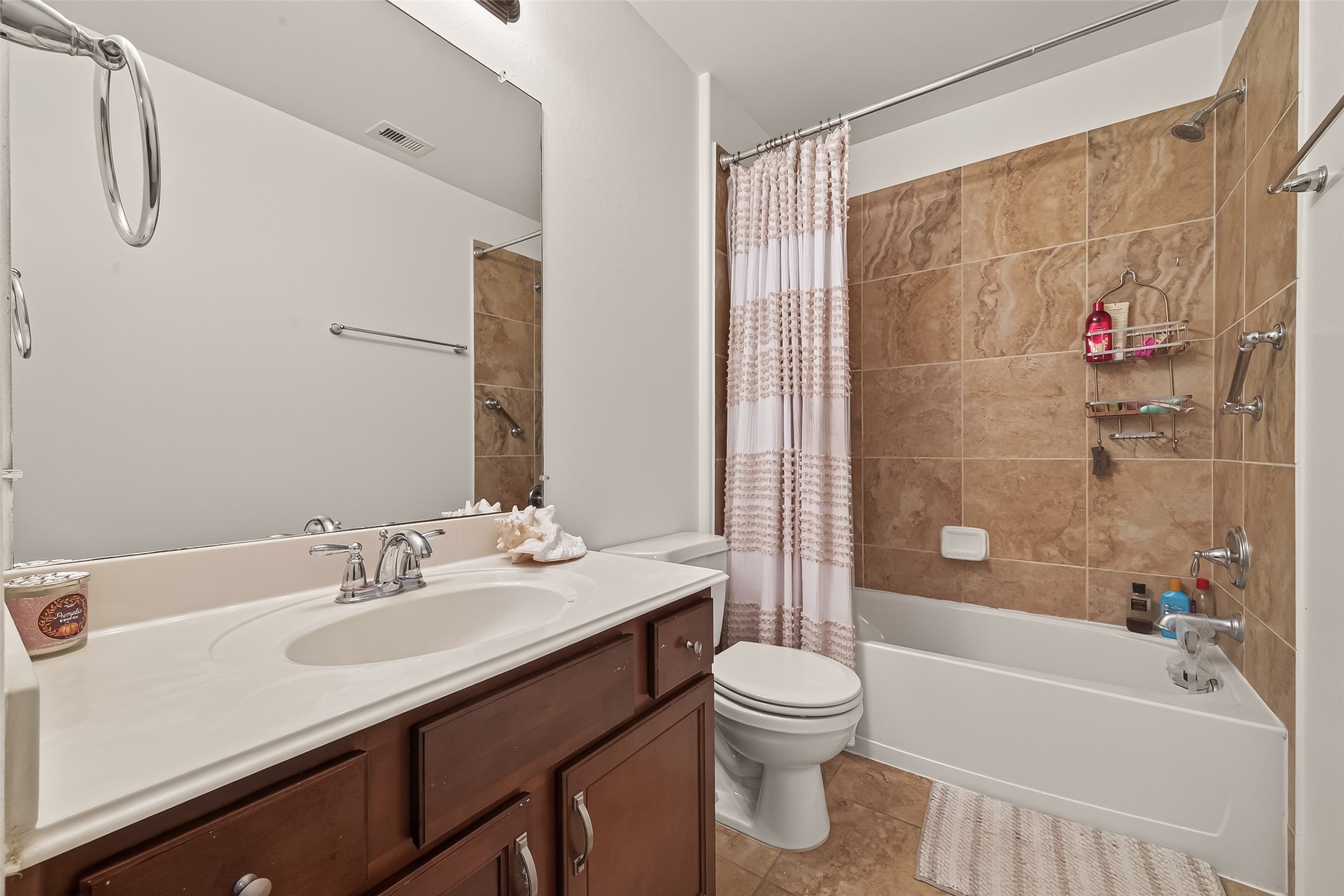 15607 Mossy Park Cypress, TX 77429 - Photo 31 of 34 a bathroom with a sink and a mirror