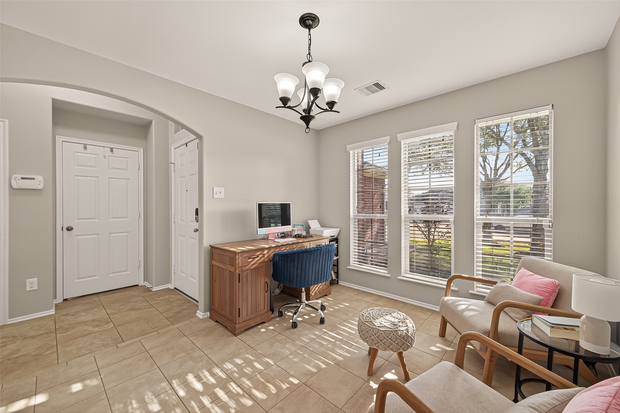 15607 Mossy Park Cypress, TX 77429 - Photo 5 of 34 a workspace with chandelier