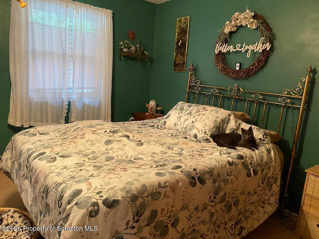 107 Keystone Hls Road, Unit 407 Factoryville, PA 18419 - Photo 14 of 24 Primary Bedroom