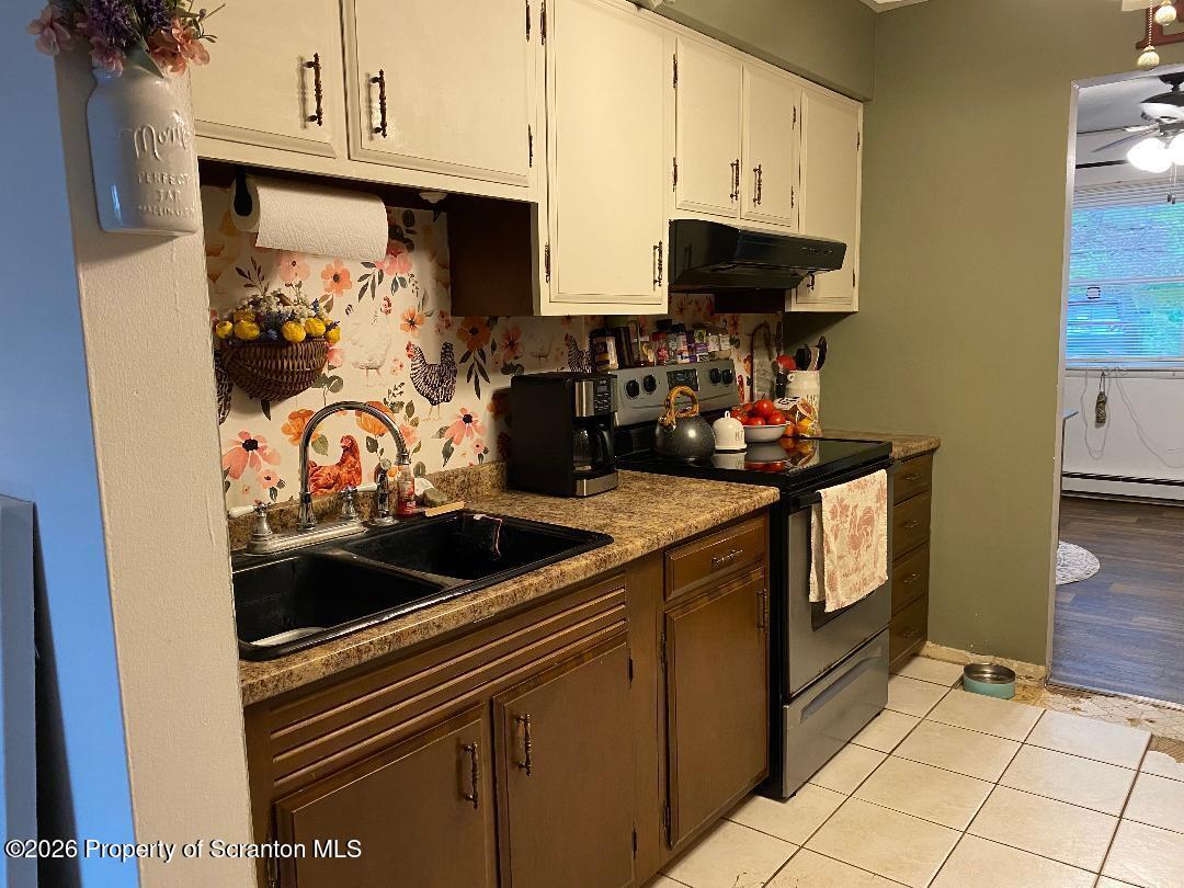 107 Keystone Hls Road, Unit 407 Factoryville, PA 18419 - Photo 9 of 24 Kitchen 4