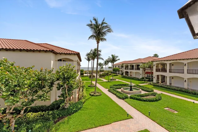 a view of a hallway with windows