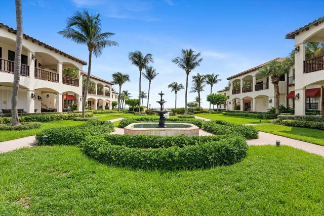 a view of a swimming pool with a lounge chair