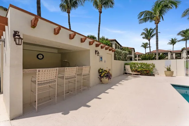 a view of a balcony with city view and ocean view