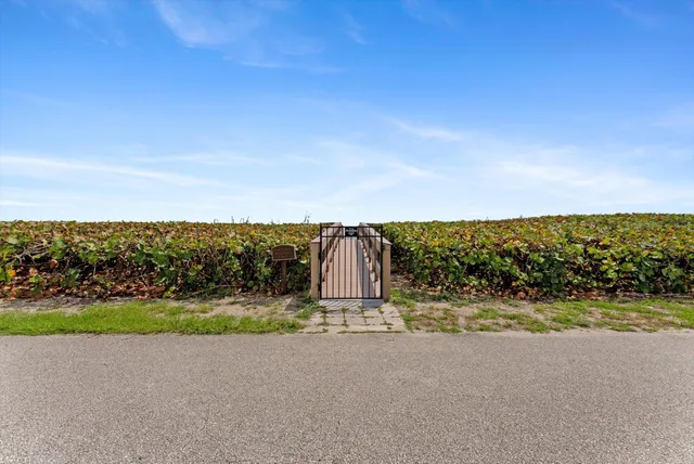 an aerial view of city and lake