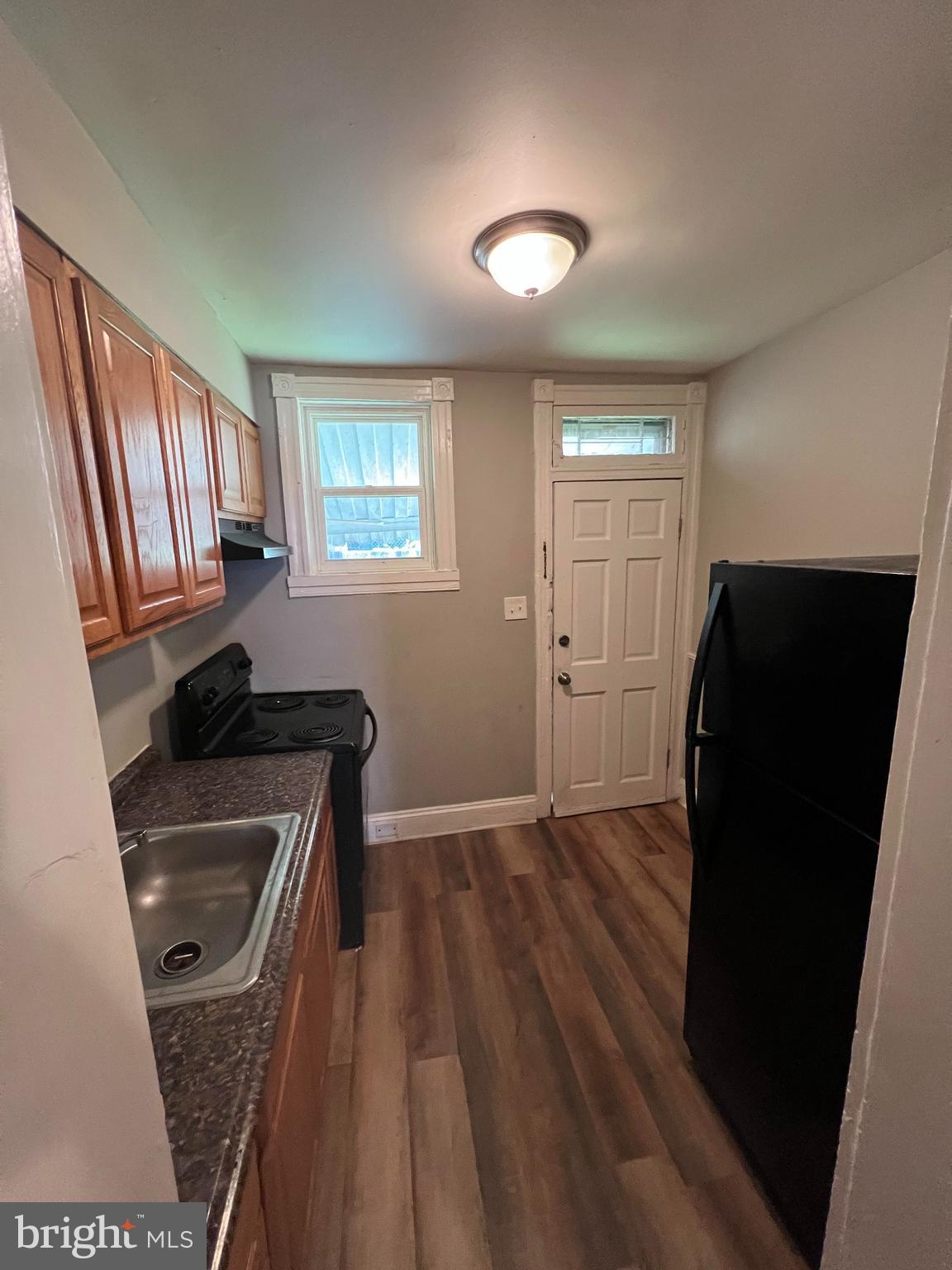 3006 Mathews Street Baltimore, MD 21218 - Photo 5 of 12 Kitchen with walk-out