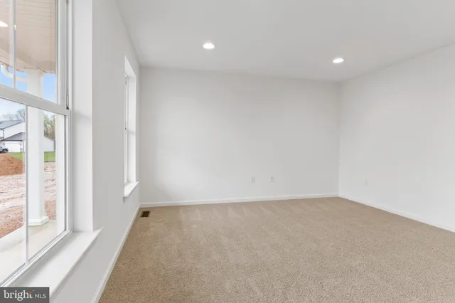 an empty room with windows