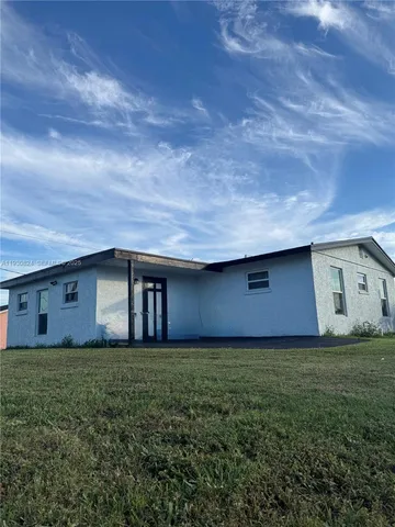 front view of house with a yard