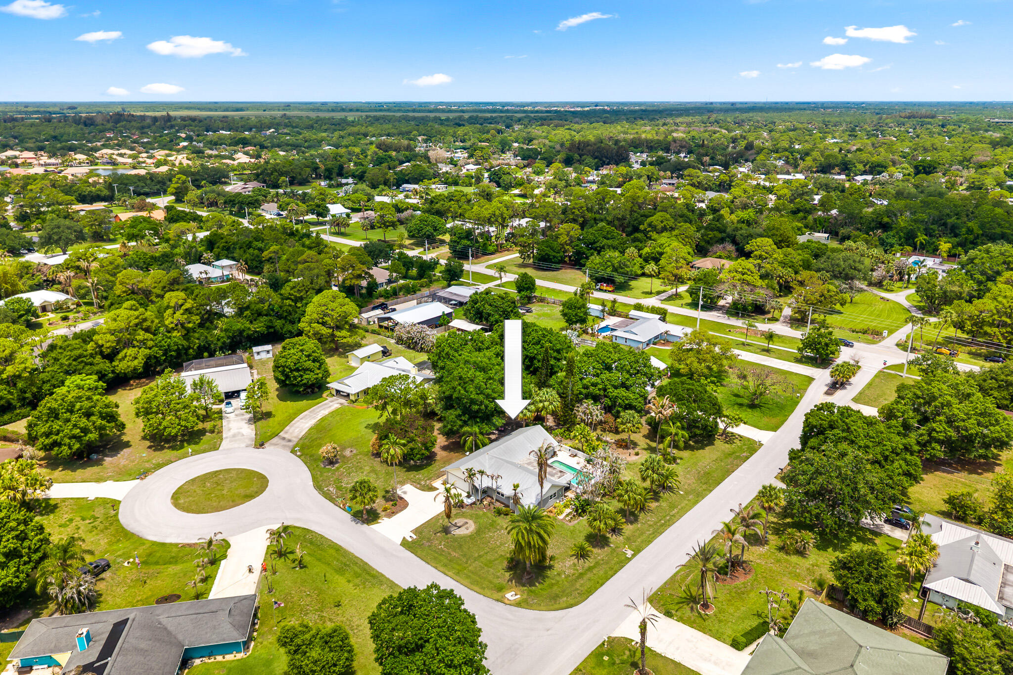 1653 Southwest 85th Terrace Stuart, FL 34997 - Photo 8 of 54 an aerial view of residential houses with outdoor space
