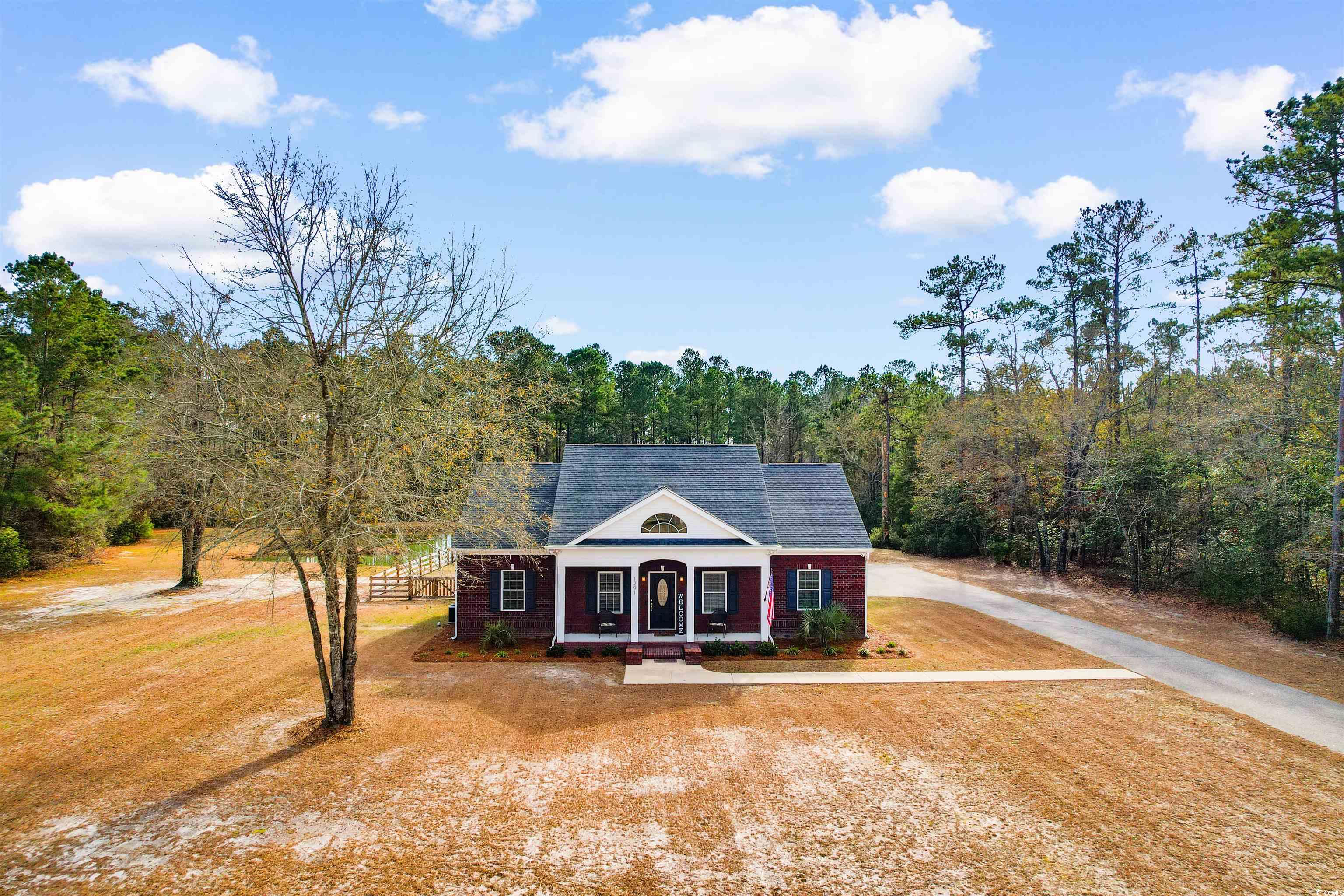 1291 Pisgah Church Road Aynor, SC 29511 - Photo 1 of 39 View of front facade featuring a porch