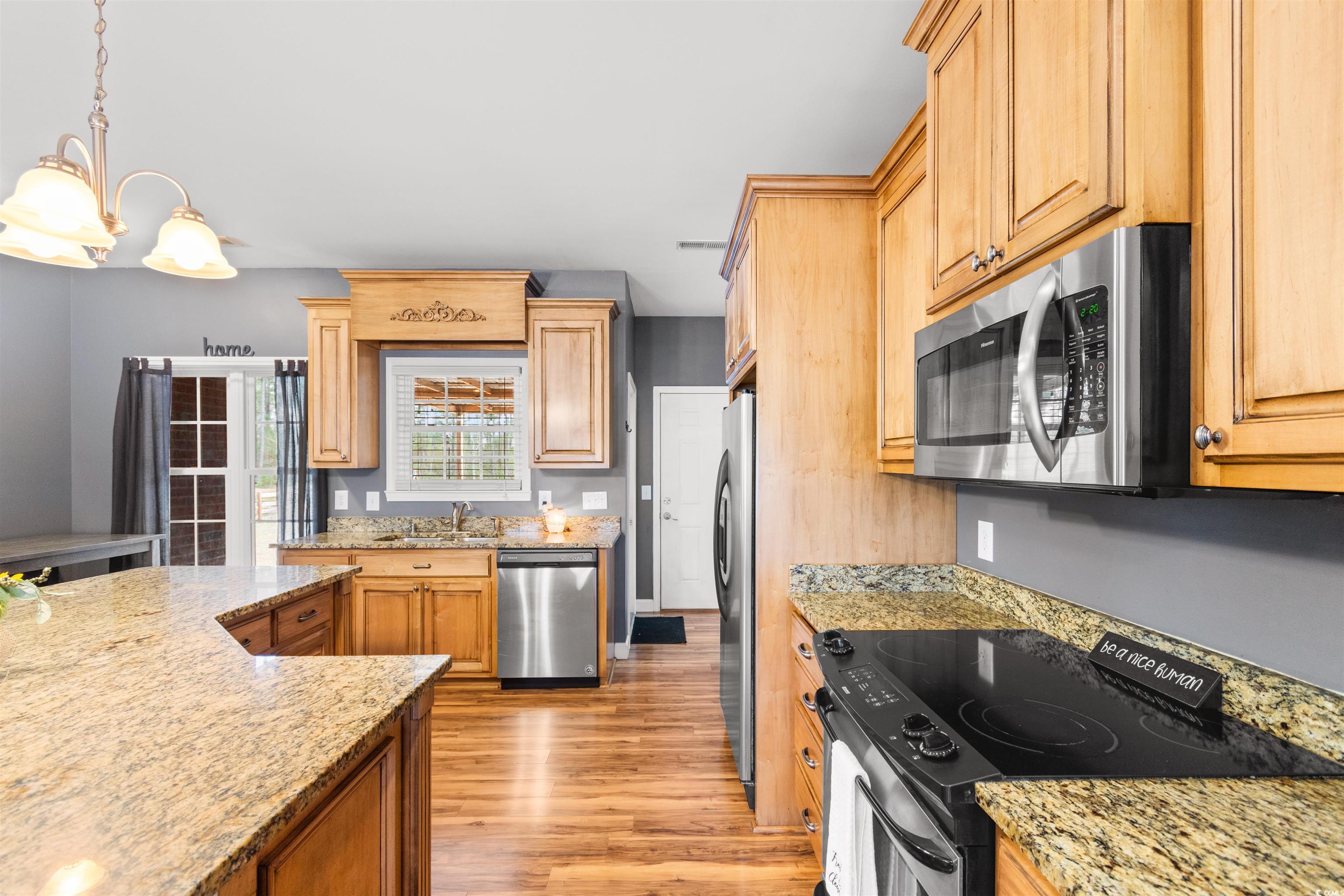 1291 Pisgah Church Road Aynor, SC 29511 - Photo 13 of 39 Kitchen featuring pendant lighting, light stone co