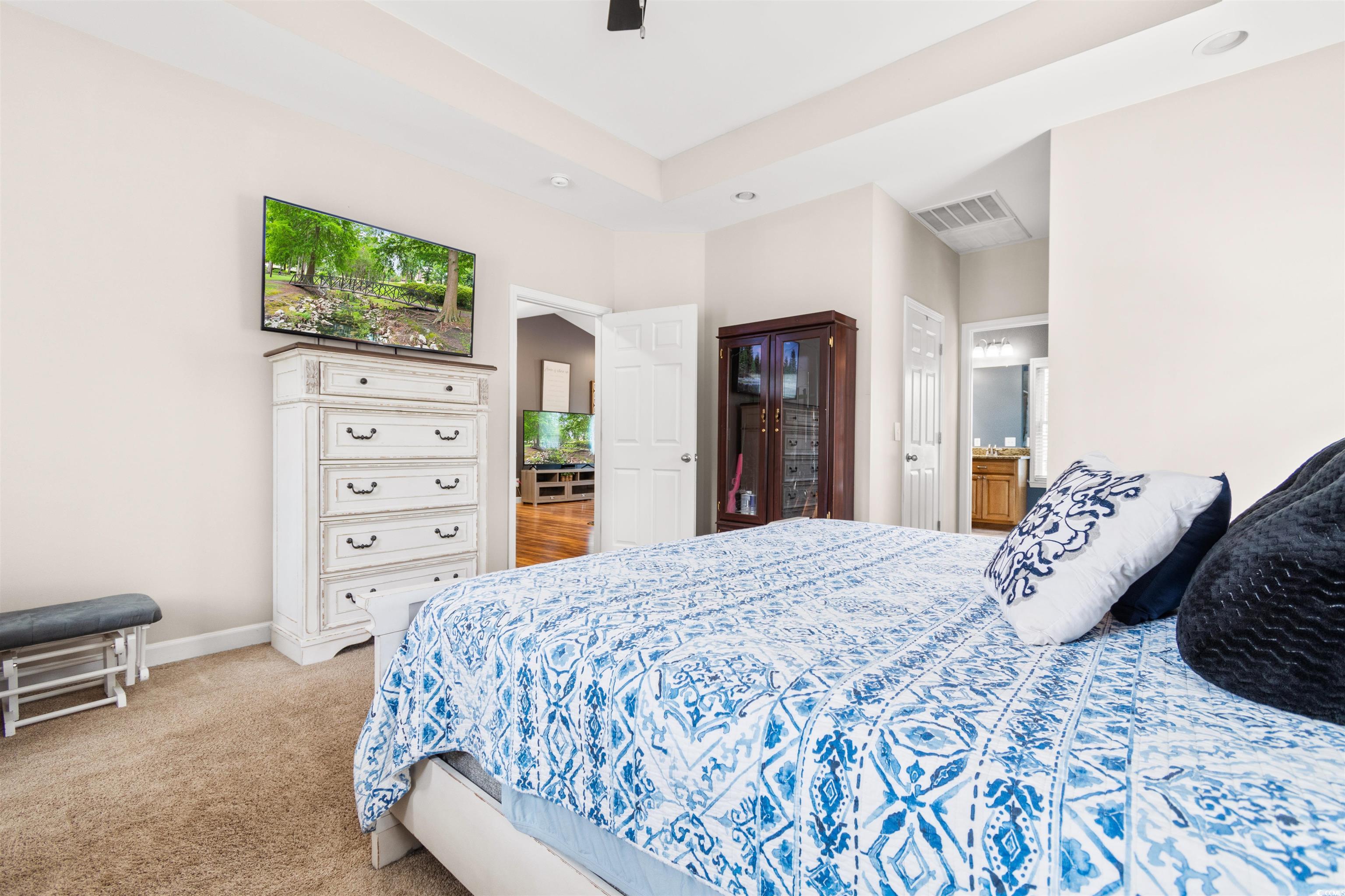 1291 Pisgah Church Road Aynor, SC 29511 - Photo 20 of 39 Carpeted bedroom featuring ceiling fan and ensuite