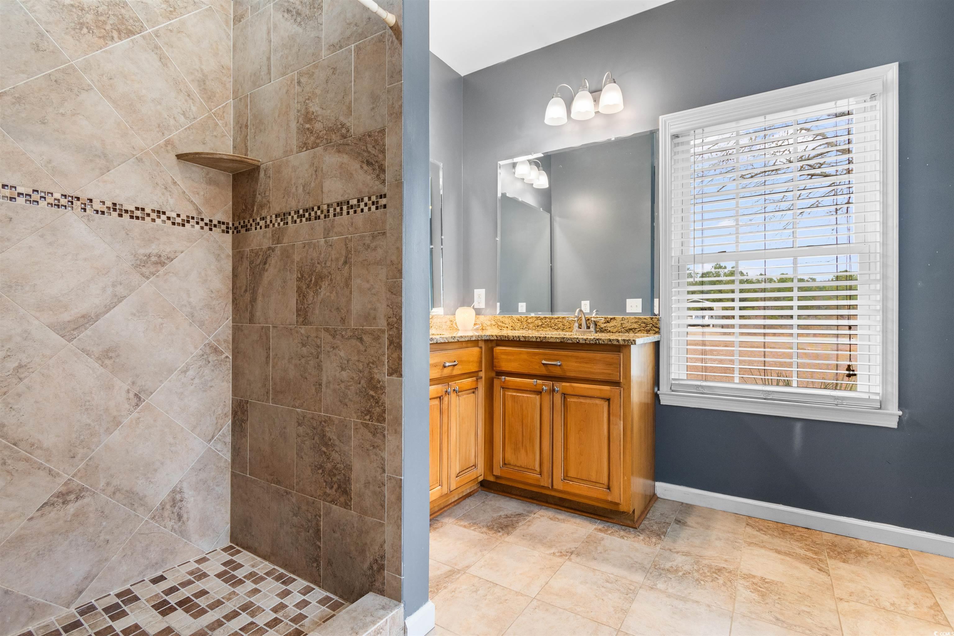 1291 Pisgah Church Road Aynor, SC 29511 - Photo 21 of 39 Bathroom featuring tiled shower and vanity
