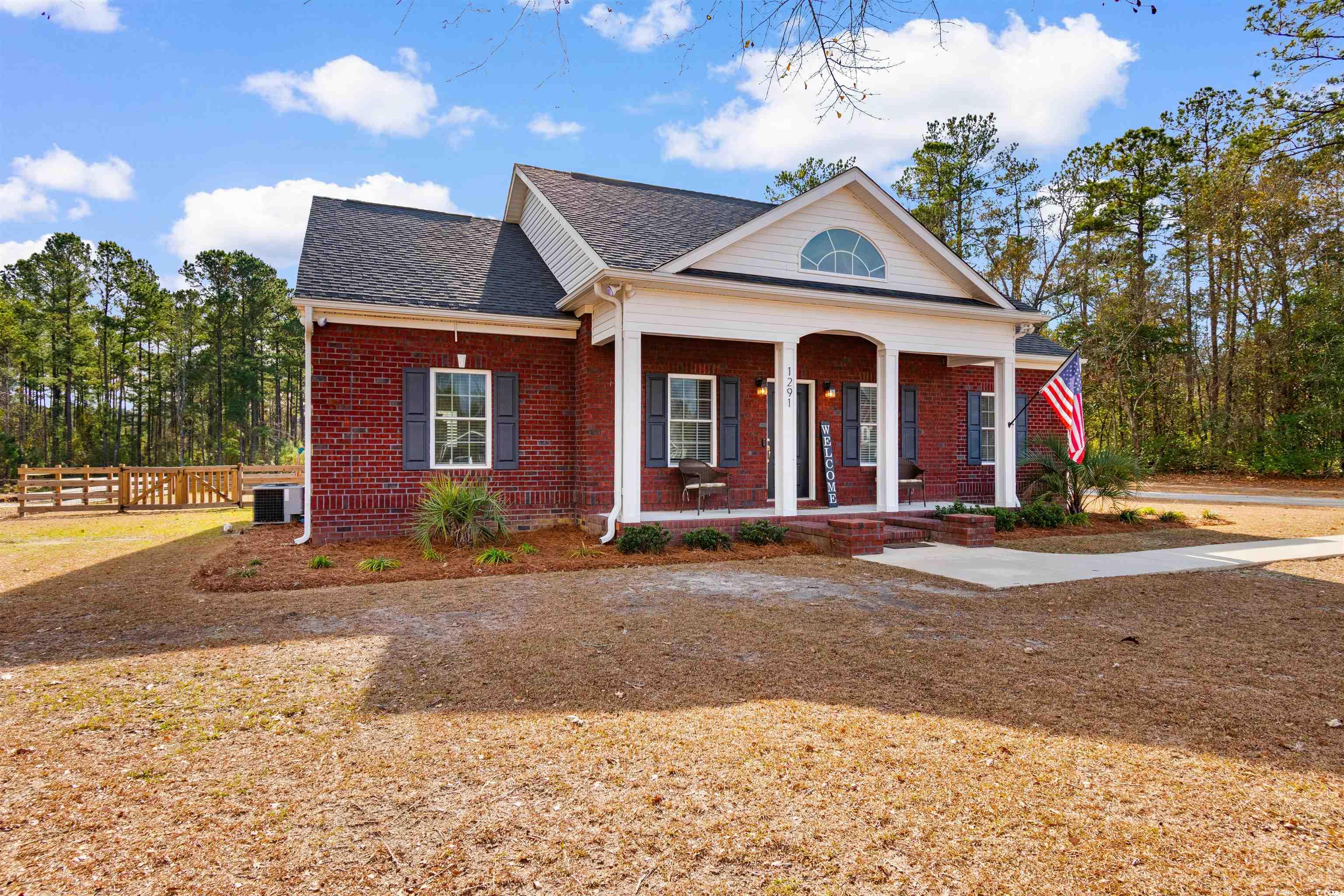 1291 Pisgah Church Road Aynor, SC 29511 - Photo 37 of 39 View of front of property with covered porch and c